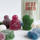 Cozy Candy Mix Bag of snow-dusted sour gummies styled as a Christmas stocking stuffer