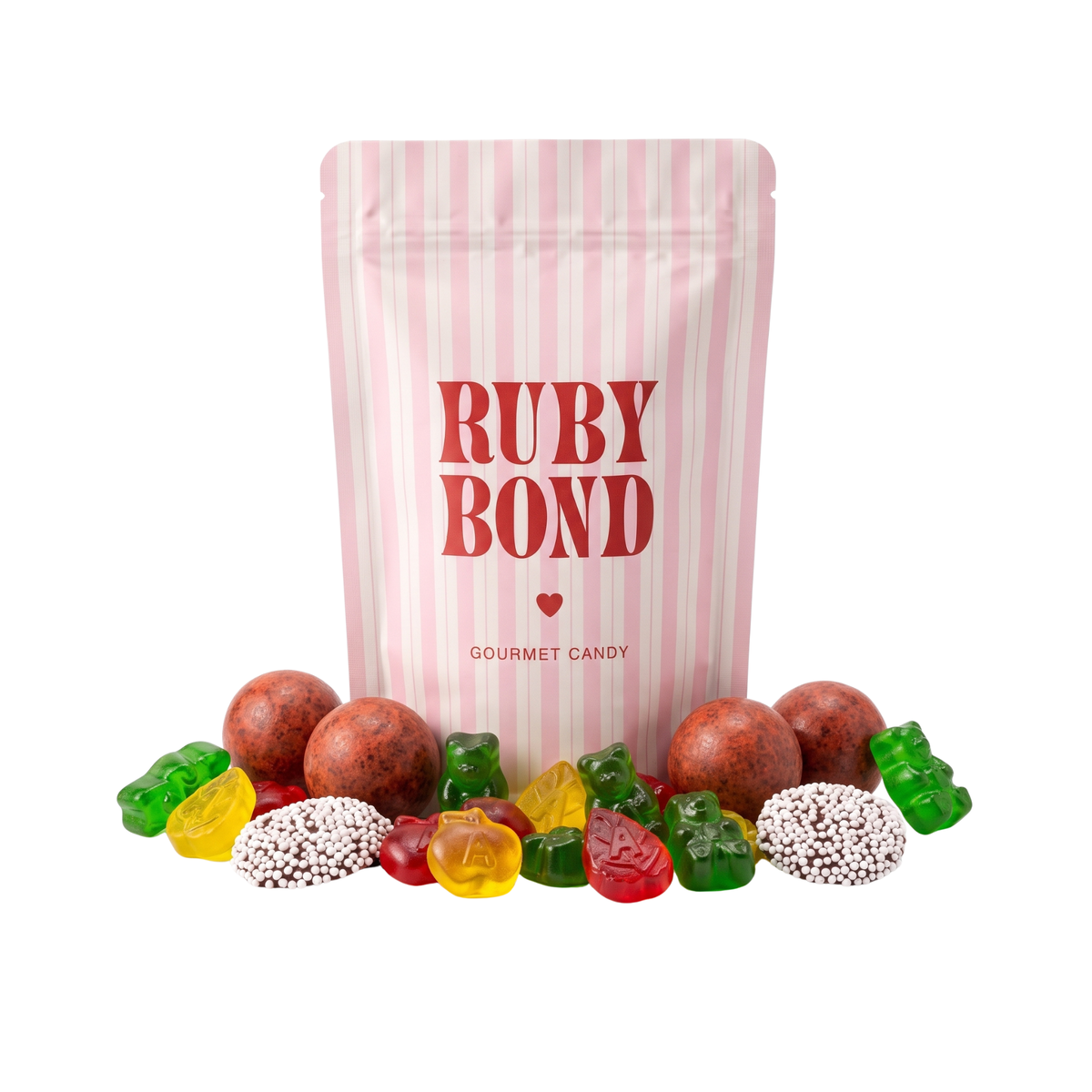 Ruby Bond Gourmet Candy bag of The Fall Edit with pumpkin spice malt balls, apple gummies, green gummi bears and nonpareils arranged in front.